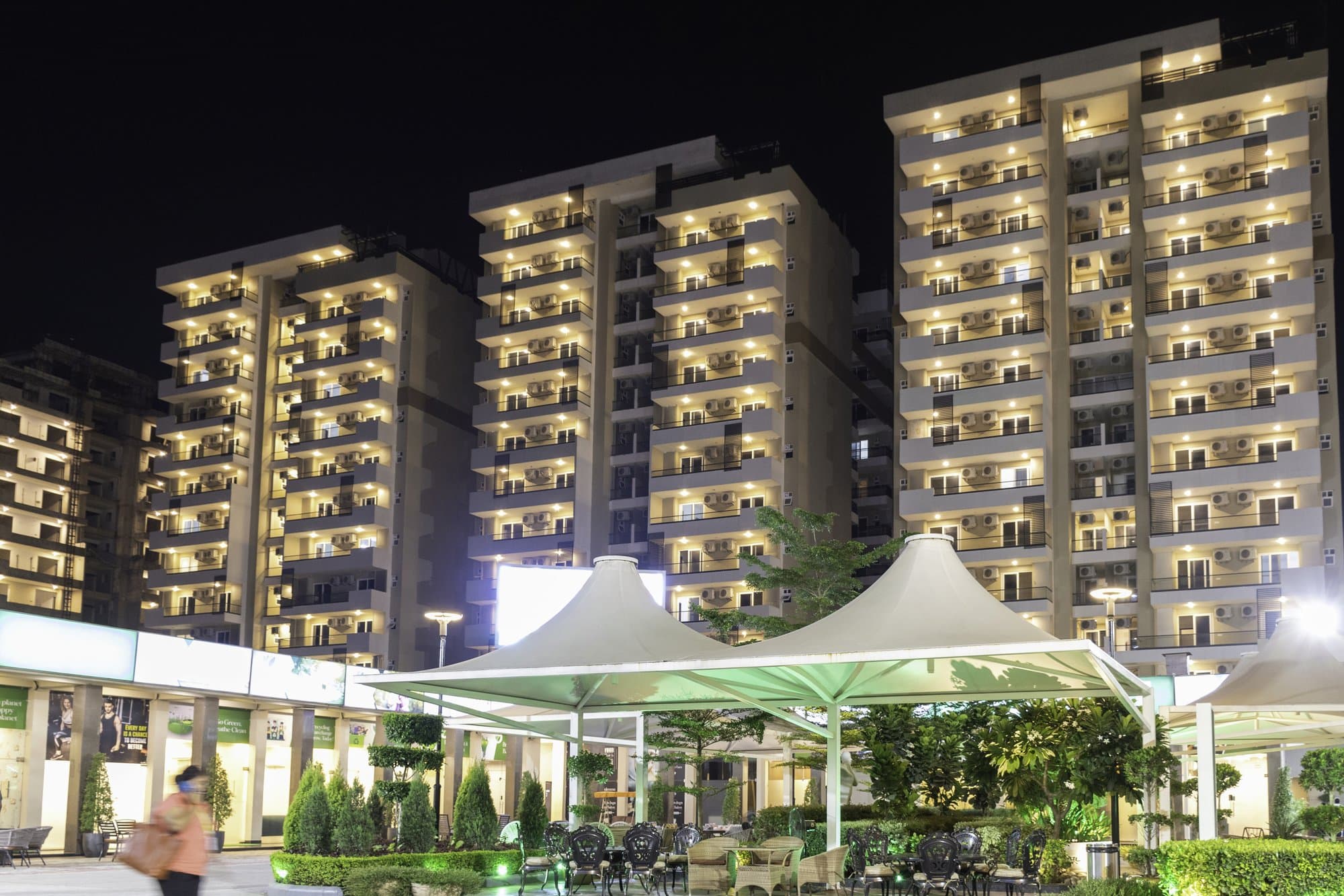 Green Lotus Utsav — the towers lit up at night